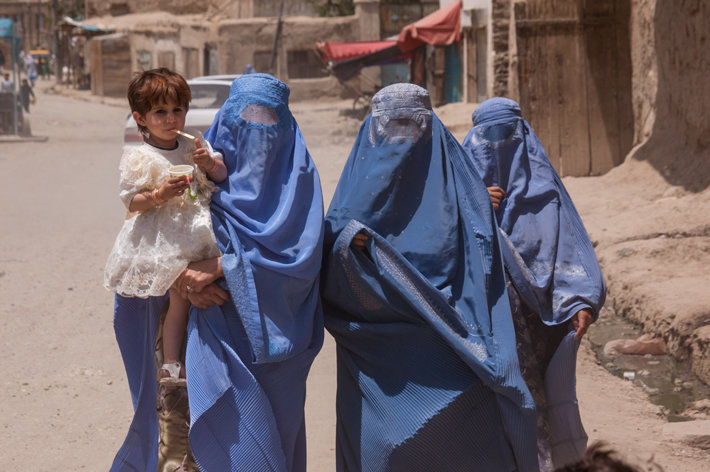 Women in burquas in Kabul (Photo by timsimages.uk, Shutterstock.com)