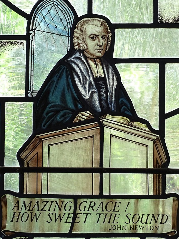 Stained glass image of John Newton, “ Amazing Grace” author at St. Peter and Paul Church Olney Buckinghamshire, England